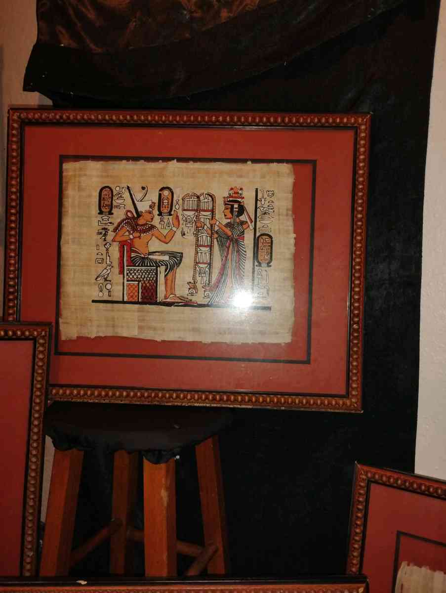 a set of 4 framed Egyptian pictures