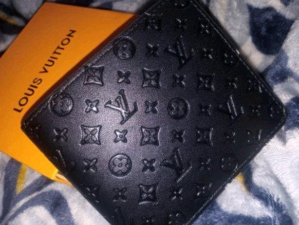 black LV wallet - Warren, Michigan