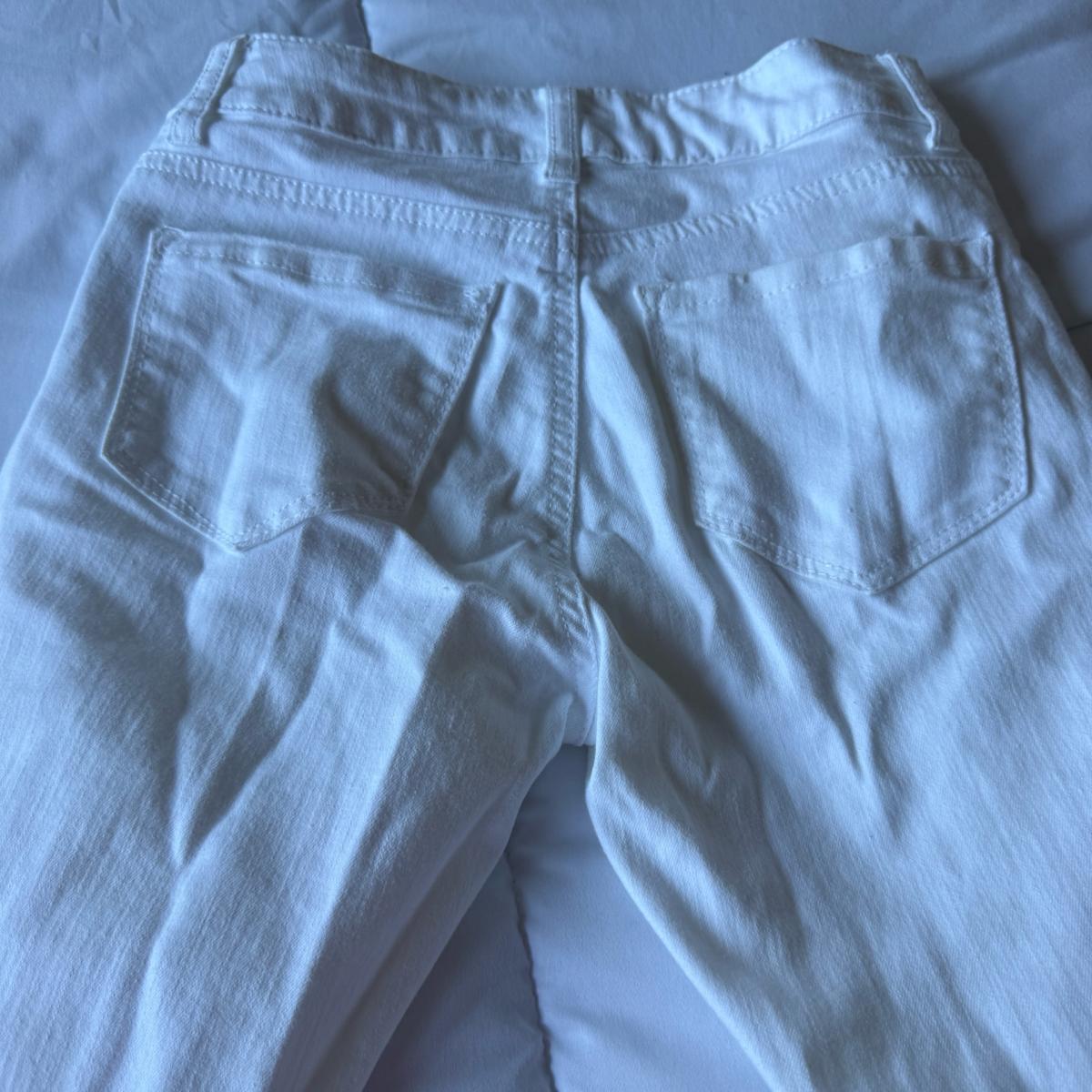 Pair of WAX JEANS white distressed skinny jeans made in USA - Los Angeles, California - FleaMarketBay