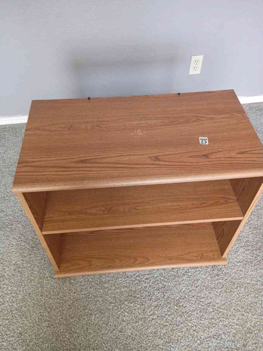 a very beautiful brown wood TV stand which is very gorgeous