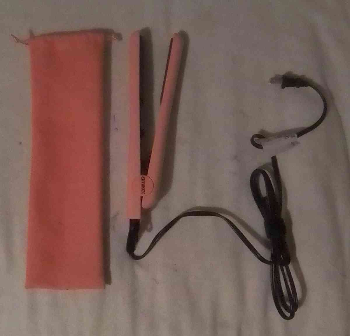 orange and black curling iron