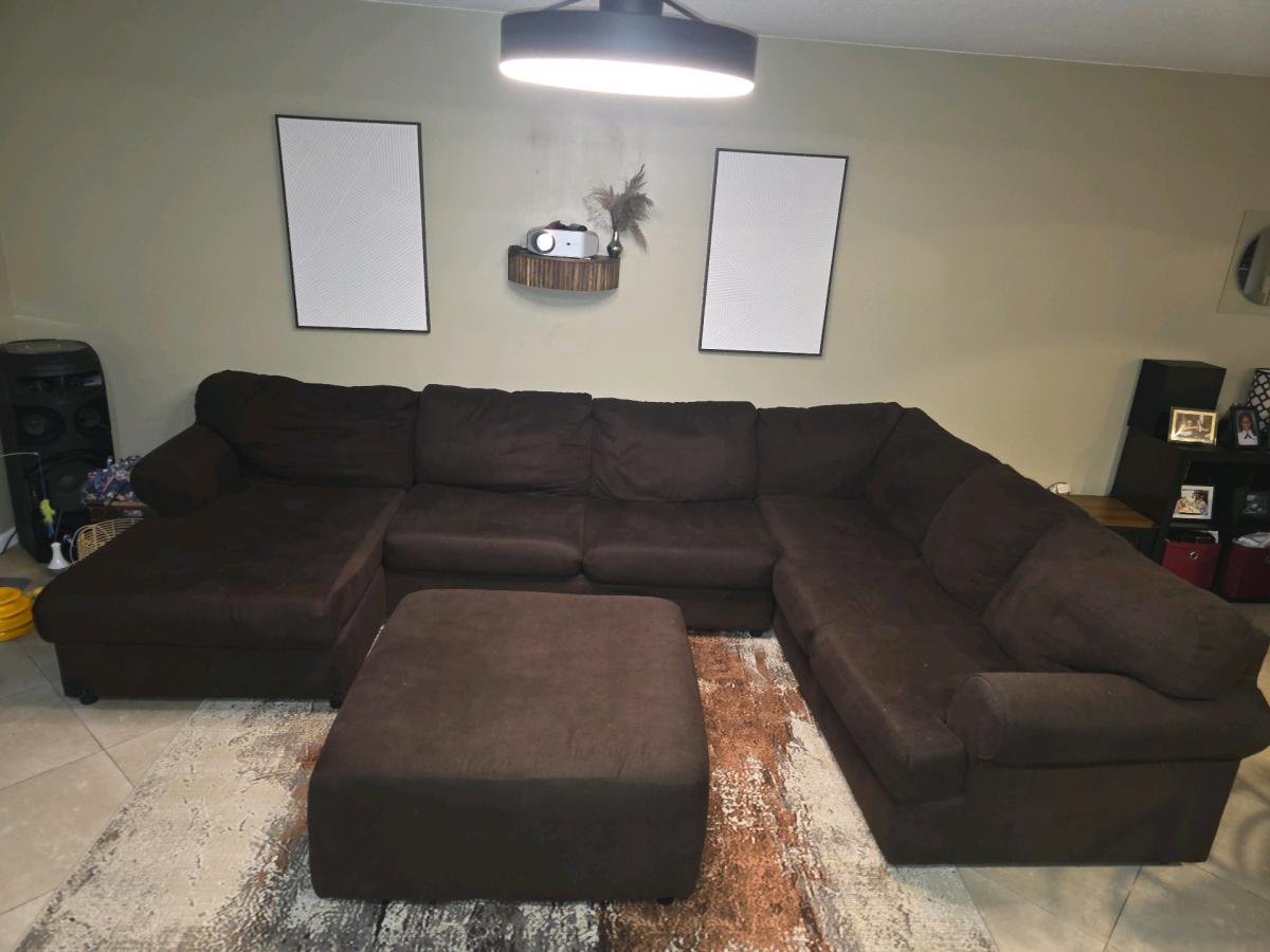 brown sectional sofa with ottman