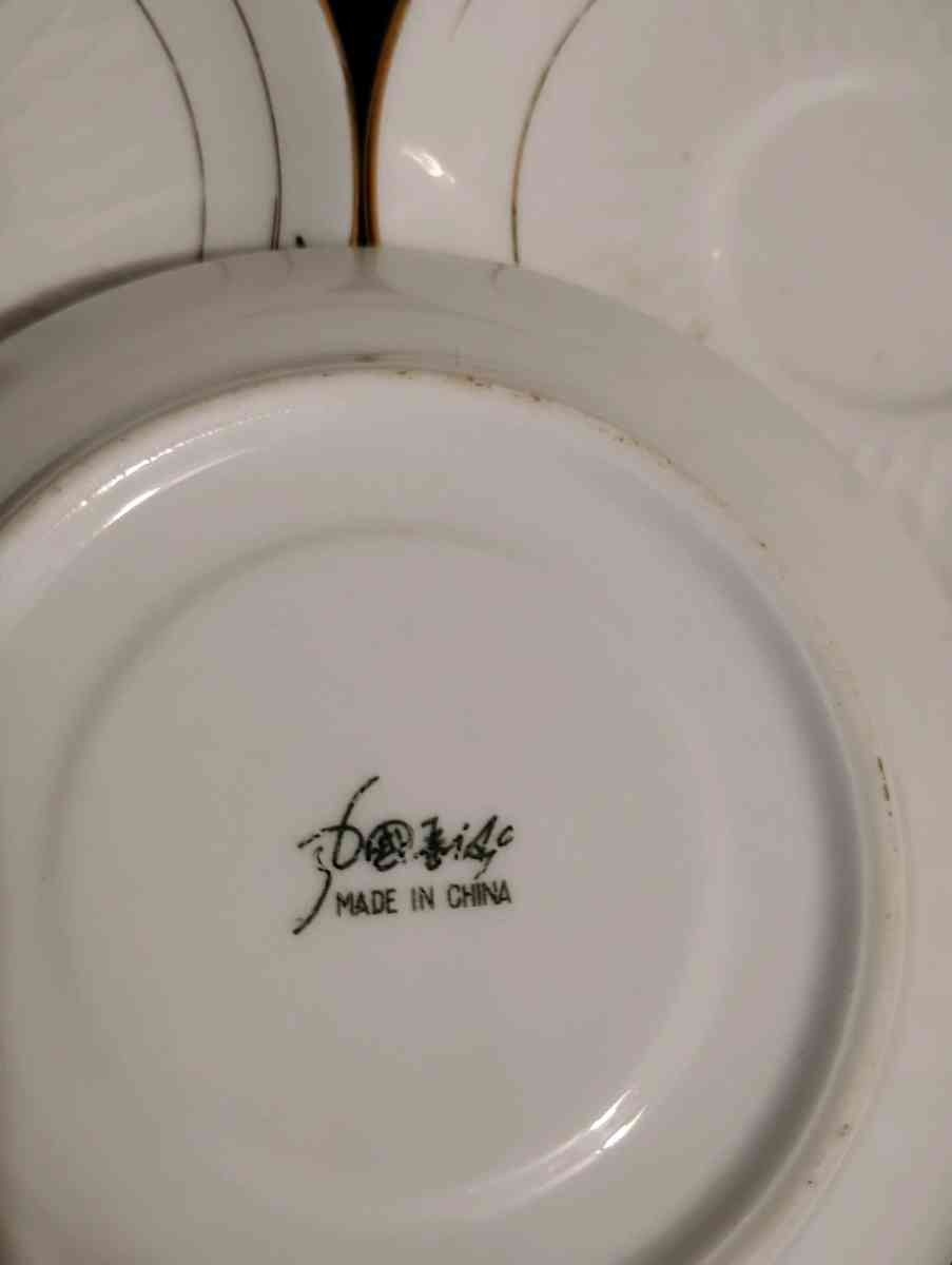 Set of 5 white with gold trim teacup saucers