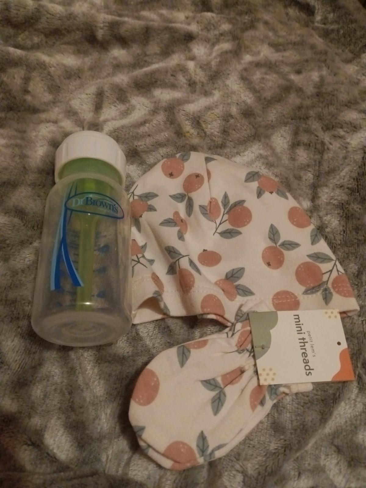 baby hat and bottle and mini threads