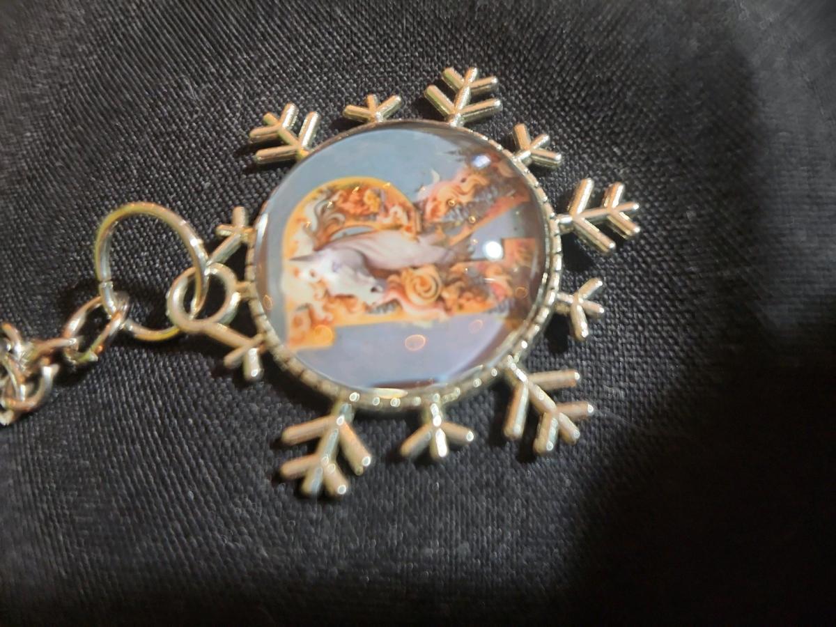 a snowflake pendant with a unicorn and the letter R - Romney, West Virginia - FleaMarketBay
