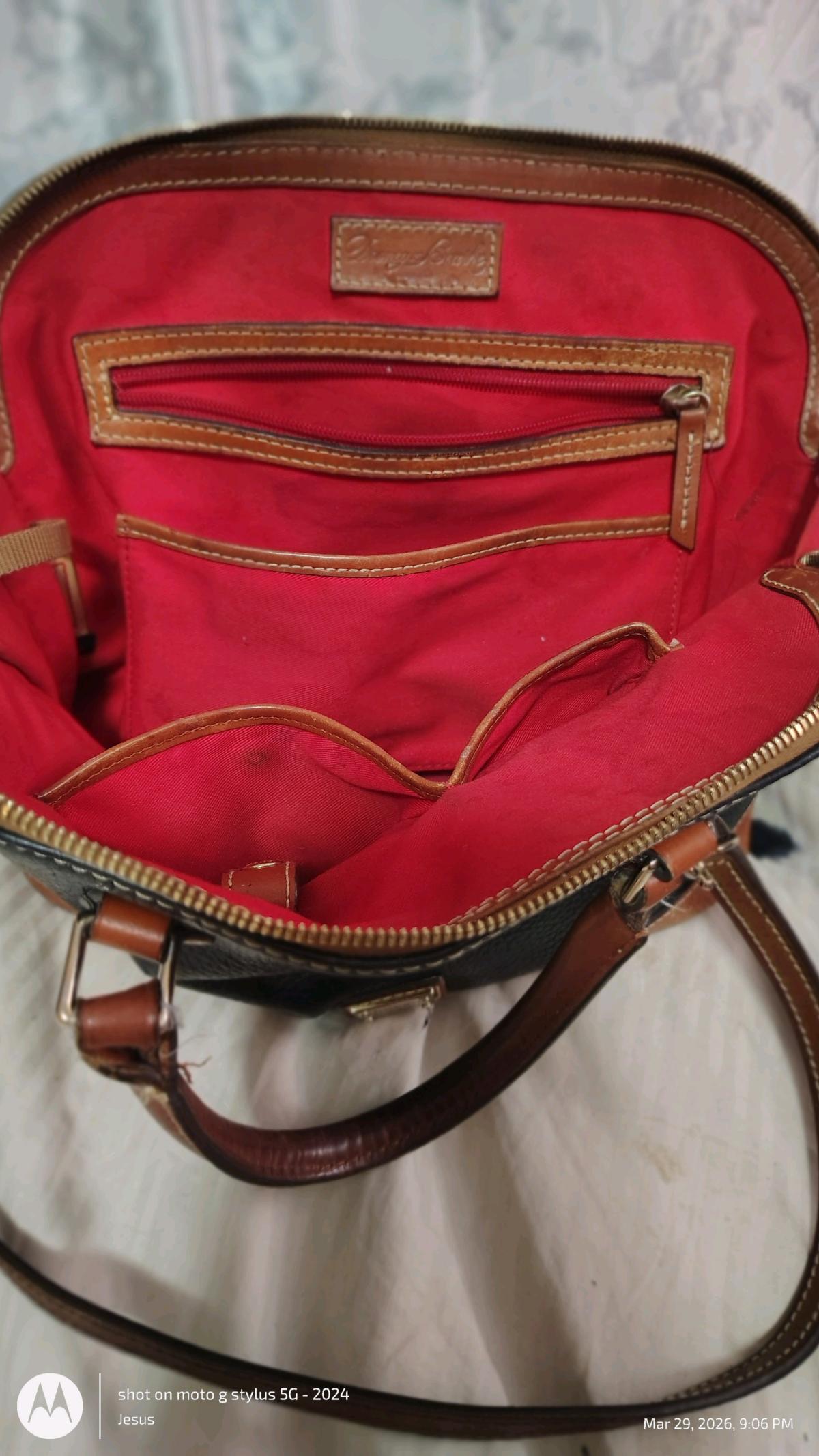 Dooney and Burke black purse with red in lining - Edmond, Oklahoma - FleaMarketBay