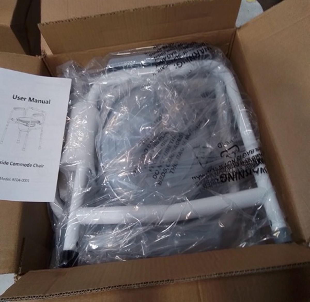 bedside senior commode brand new