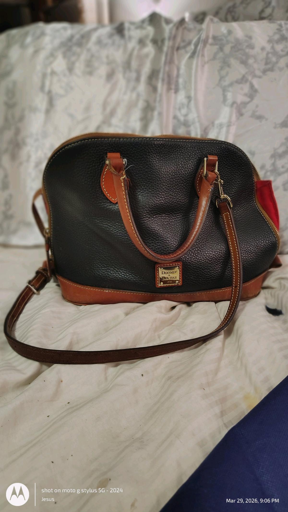 Dooney and Burke black purse with red in lining - Edmond, Oklahoma - FleaMarketBay