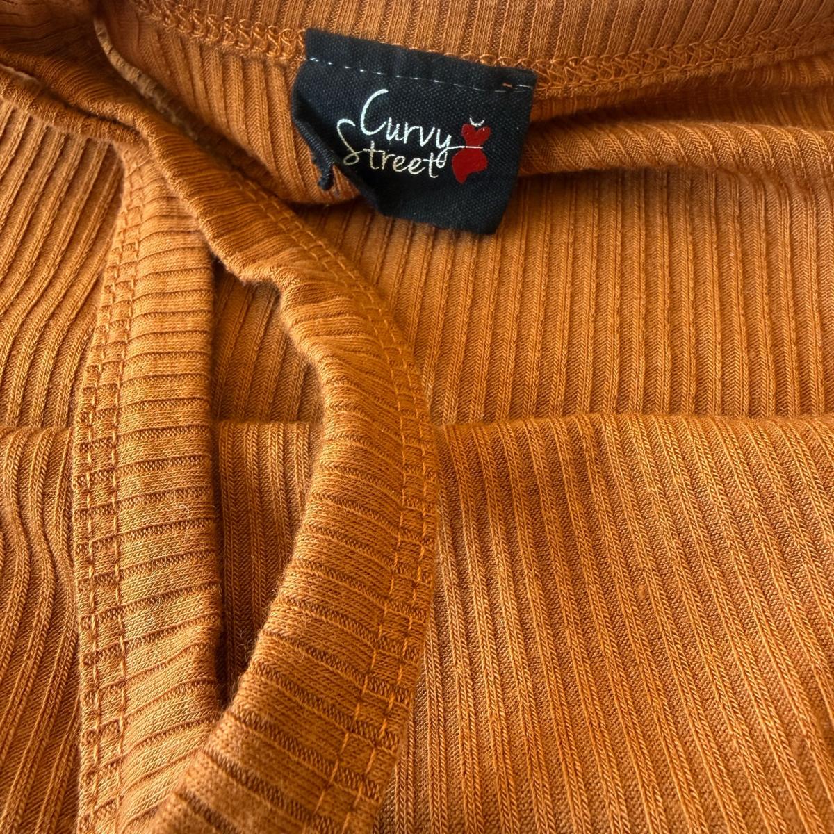 Boutique Cinnamon Ribbed Off Shoulder Crisscross Bodysuit - Los Angeles, California - FleaMarketBay