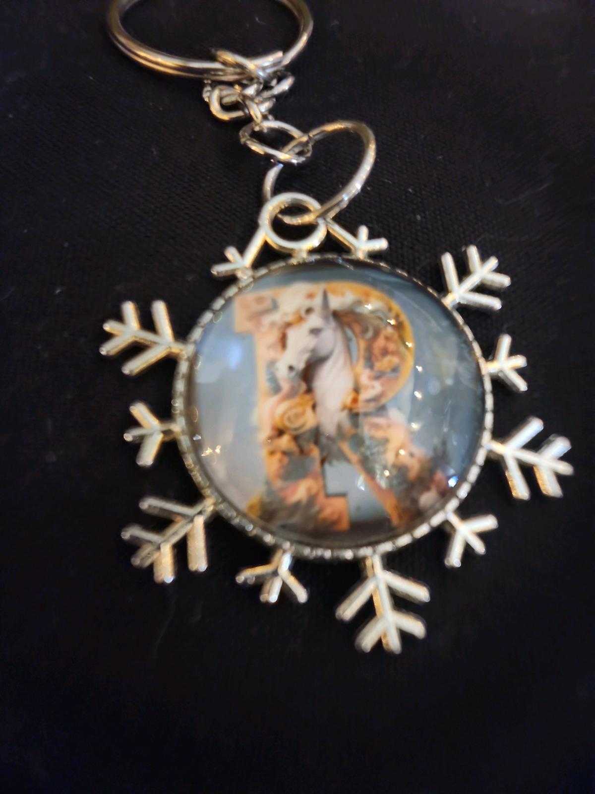 a snowflake pendant with a unicorn and the letter R - Romney, West Virginia - FleaMarketBay