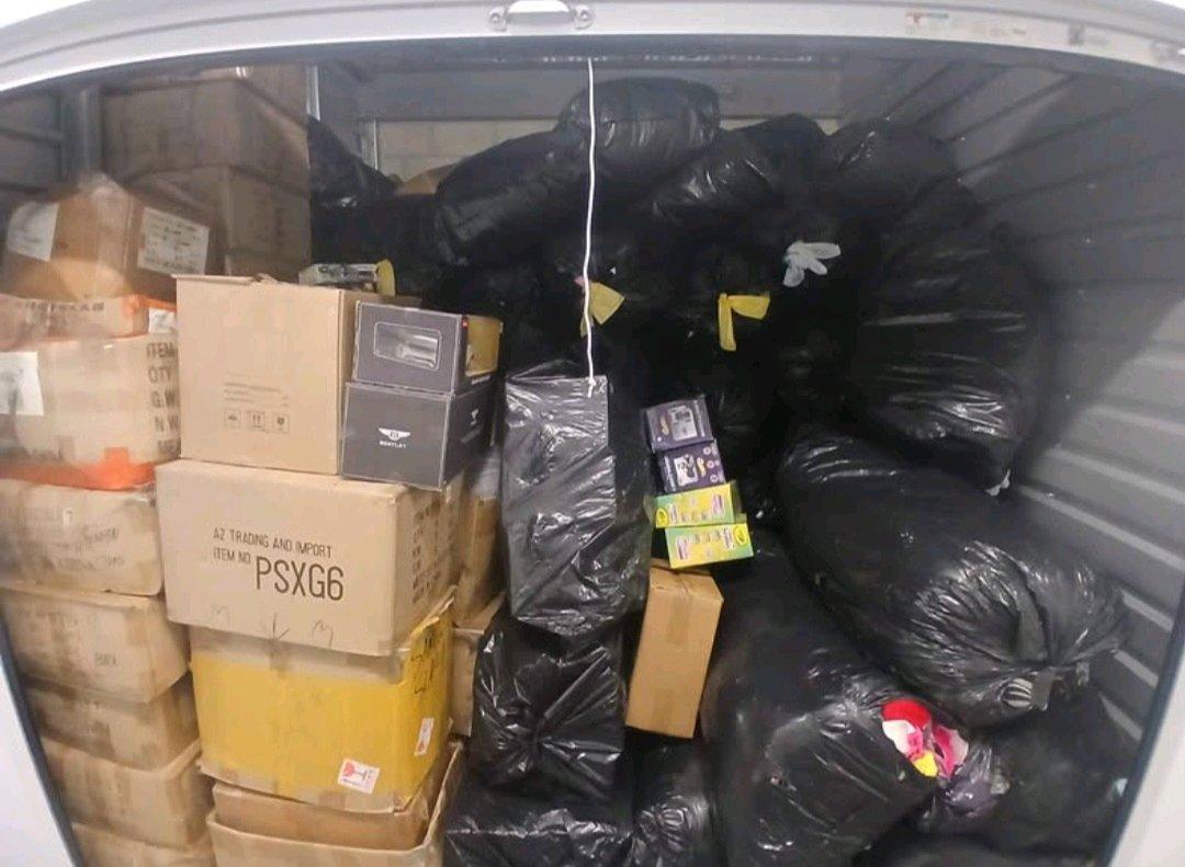 Tons of scarfs toys ect selling evrything shown