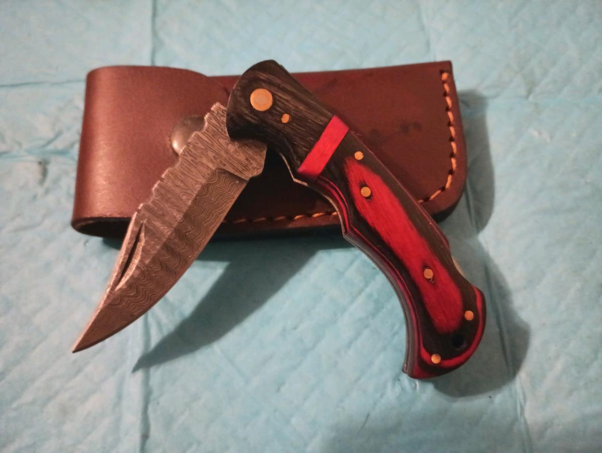 hand forged buck pocket knife with custom leather sheath