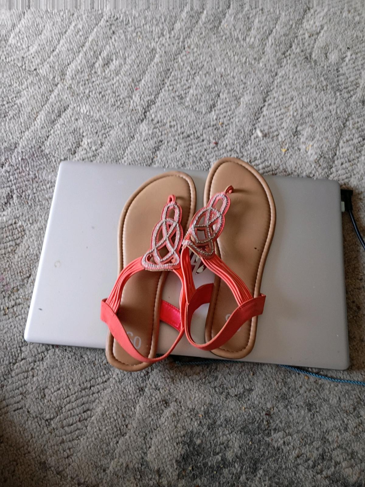 Womens orange white and black sandals