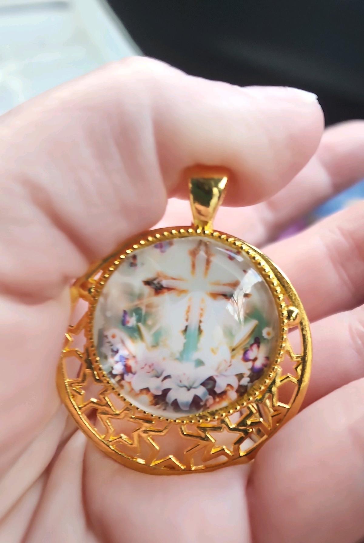 Gold pendant with a cross - Romney, West Virginia