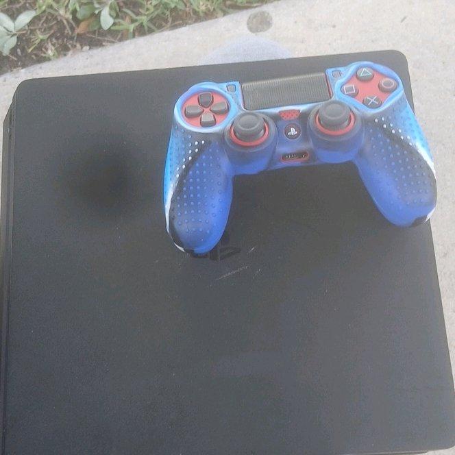 Playstation 4 comes with cord red controller and a full grip - Homestead, Florida - FleaMarketBay