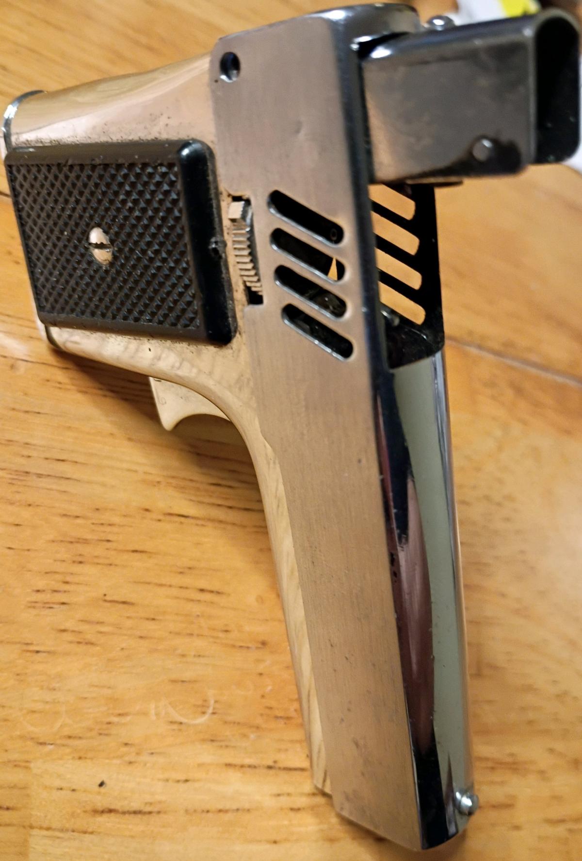 vintage Aurora penguin 45 gas lighter and flashlight combo