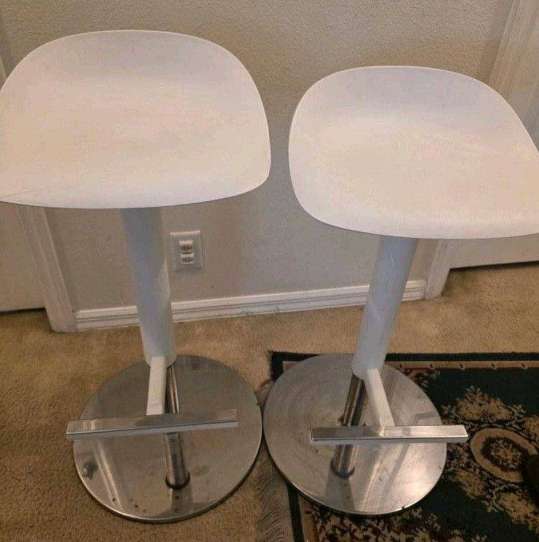 IKEA JANINGE bar stool featuring a white seat and a chrome b