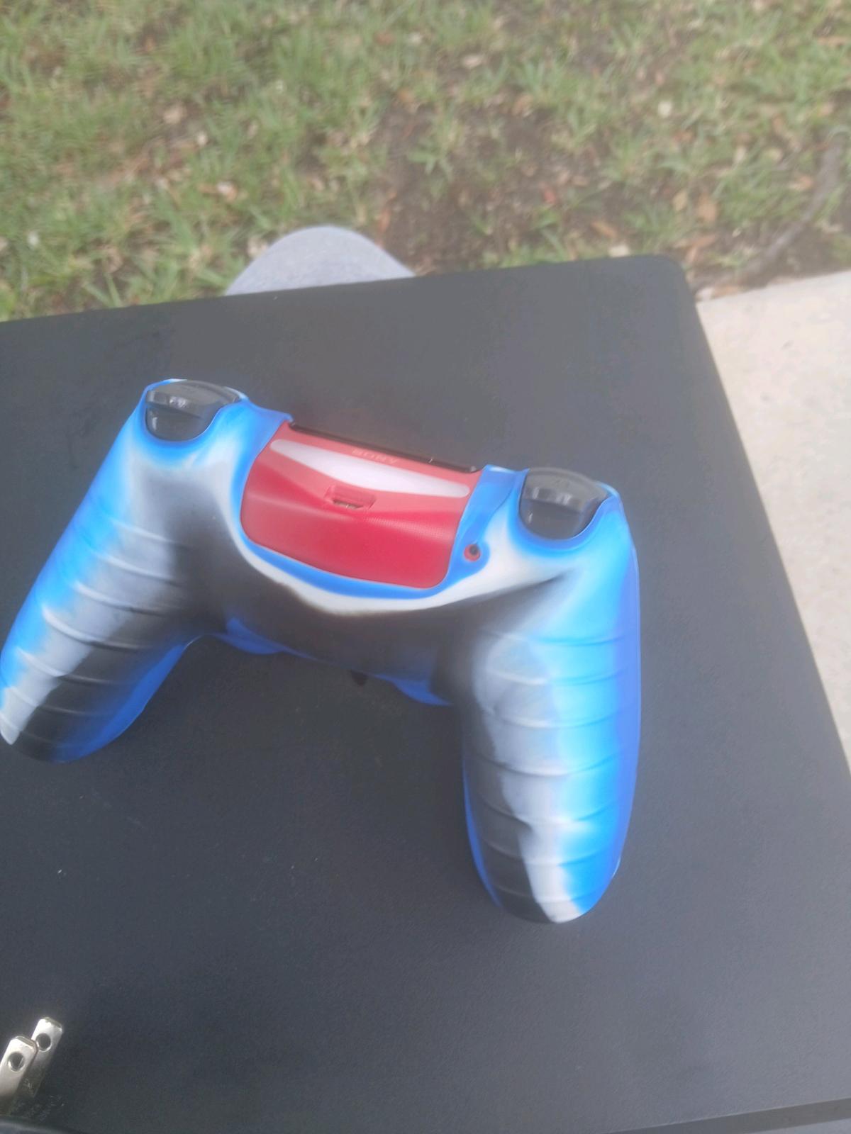 Playstation 4 comes with cord red controller and a full grip - Homestead, Florida - FleaMarketBay