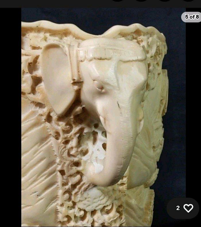 Chinese style collectible vase with 3D carvings of life