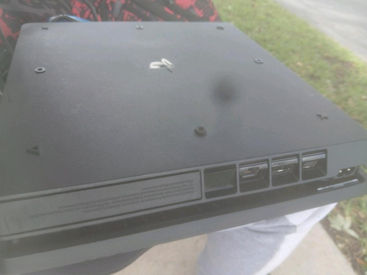 Playstation 4 comes with cord red controller and a full grip - Homestead, Florida - FleaMarketBay