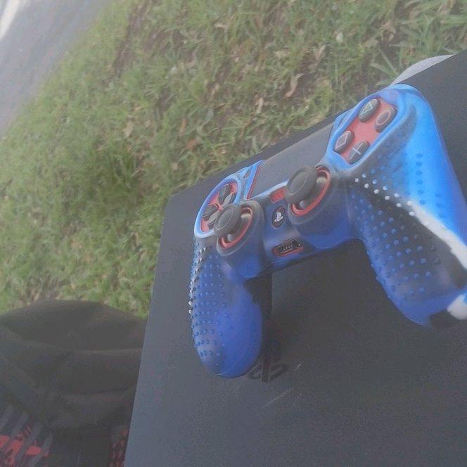 Playstation 4 comes with cord red controller and a full grip - Homestead, Florida - FleaMarketBay