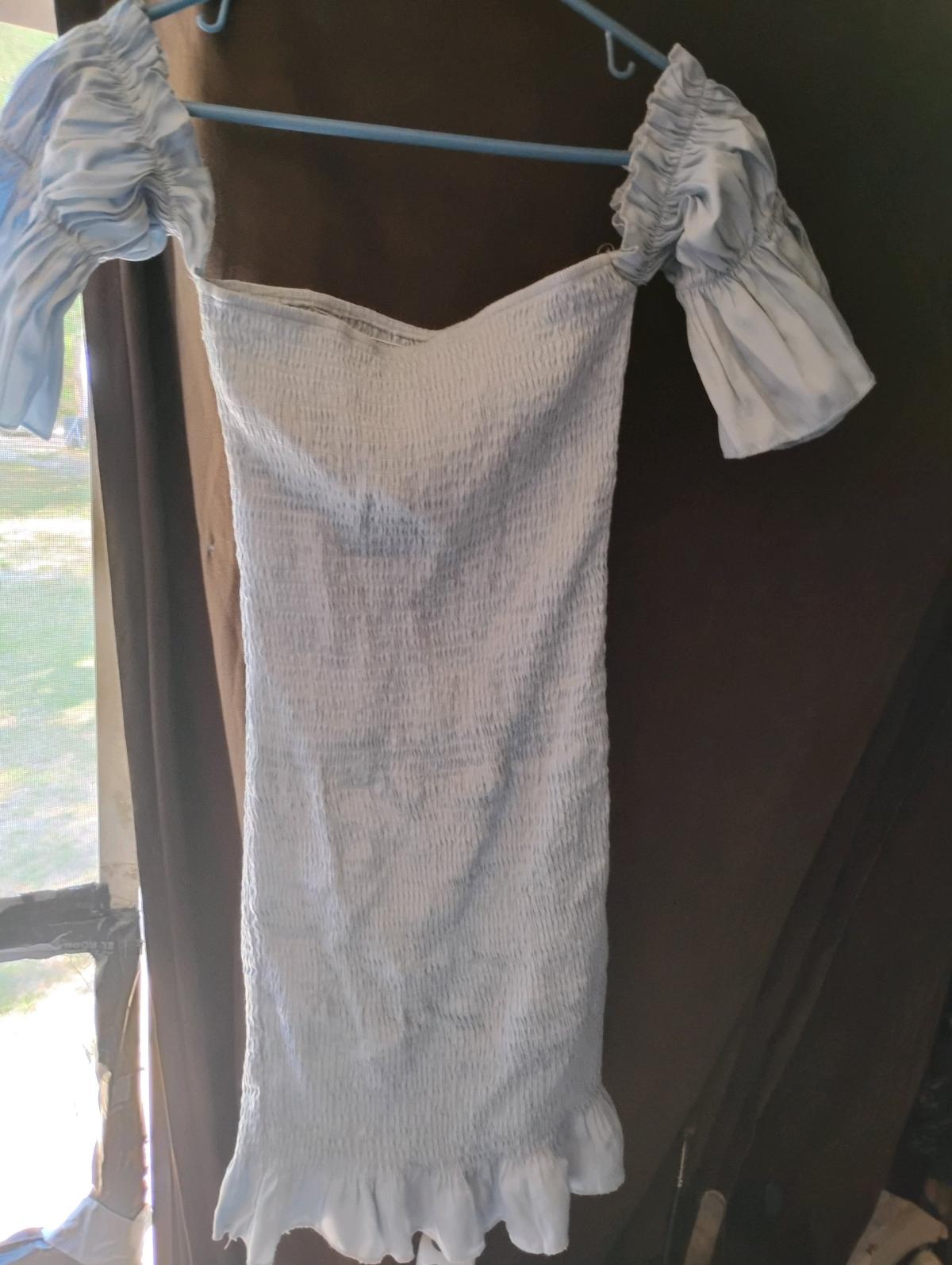 A Sexy Unique Light Blue Top w Hooked Separately - Swansea, South Carolina - FleaMarketBay