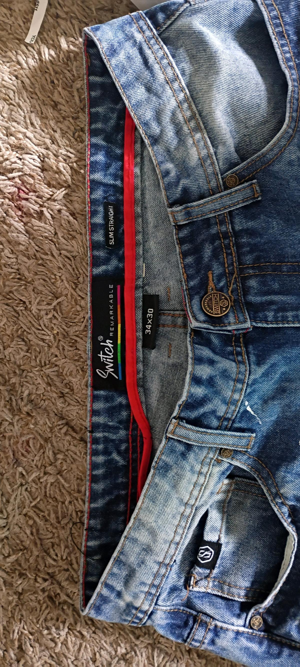 blue ripped jeans w paint splashes - Colorado Springs, Colorado - FleaMarketBay