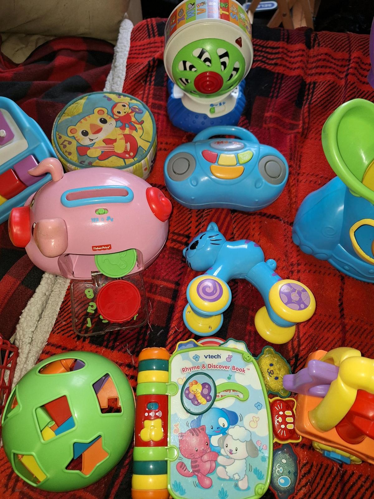 bumbo chair training potty along with toys - Claremont, New Hampshire - FleaMarketBay