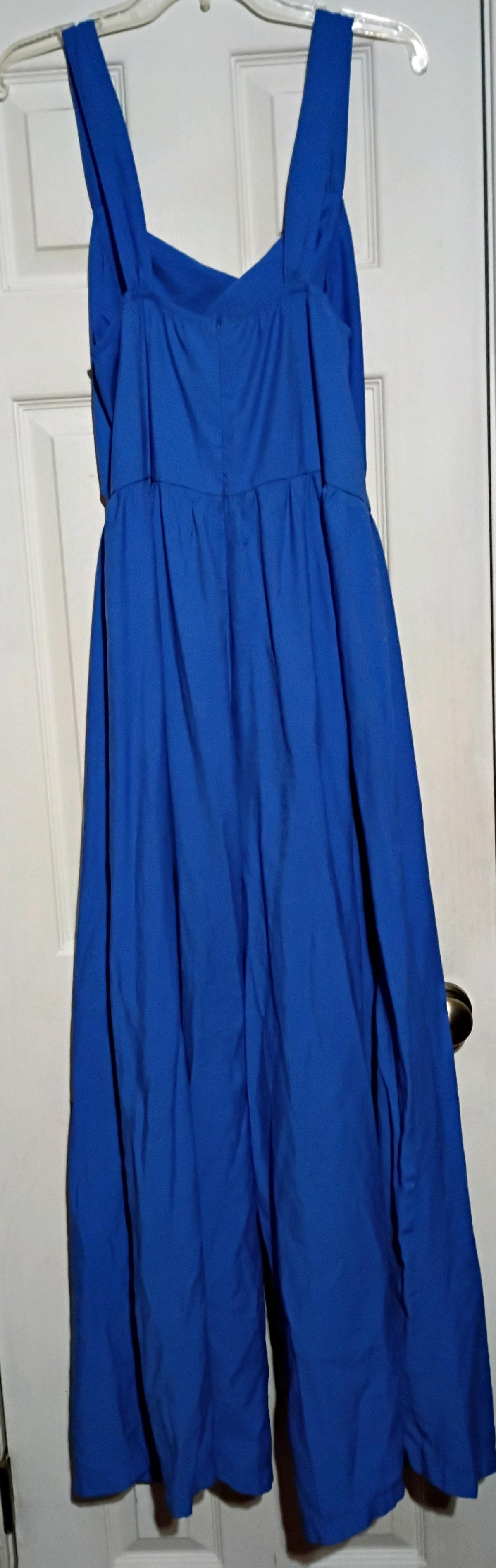 Beautiful blue jumpsuit with belly cut out by Shein - Laurel, Mississippi - FleaMarketBay