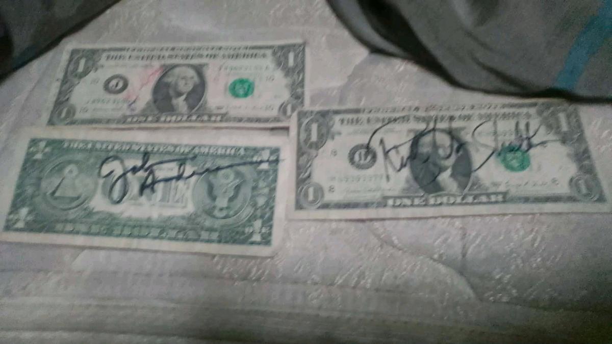 guitar picks from country singers and dollar fills singed - Waynesboro, Mississippi - FleaMarketBay