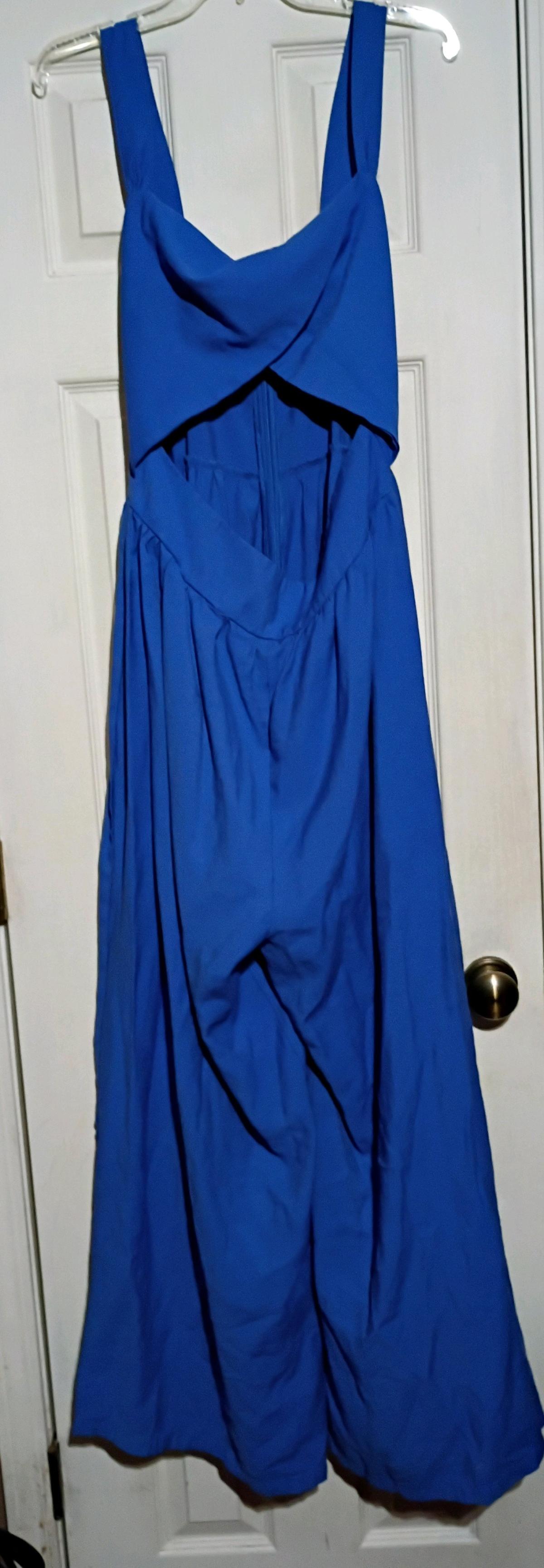 Beautiful blue jumpsuit with belly cut out by Shein - Laurel, Mississippi - FleaMarketBay