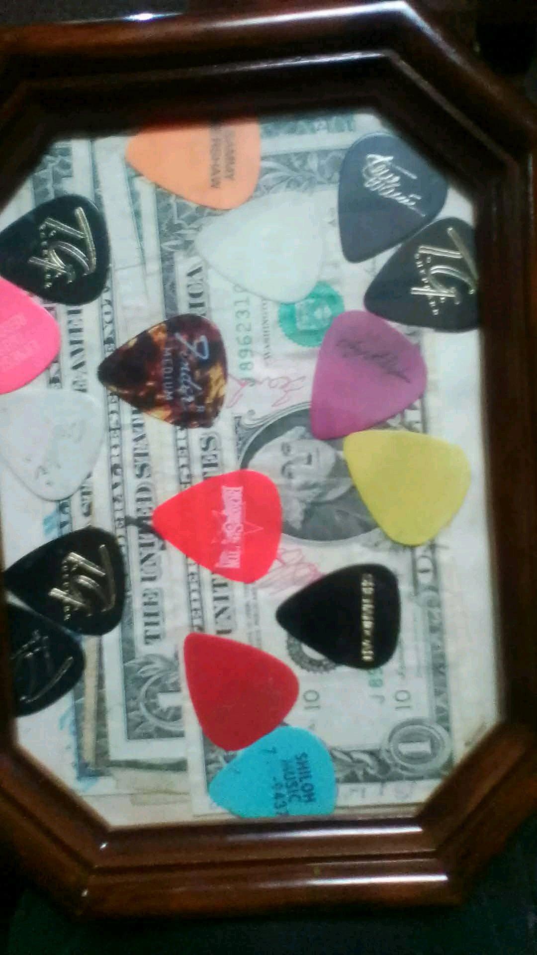 guitar picks from country singers and dollar fills singed - Waynesboro, Mississippi - FleaMarketBay