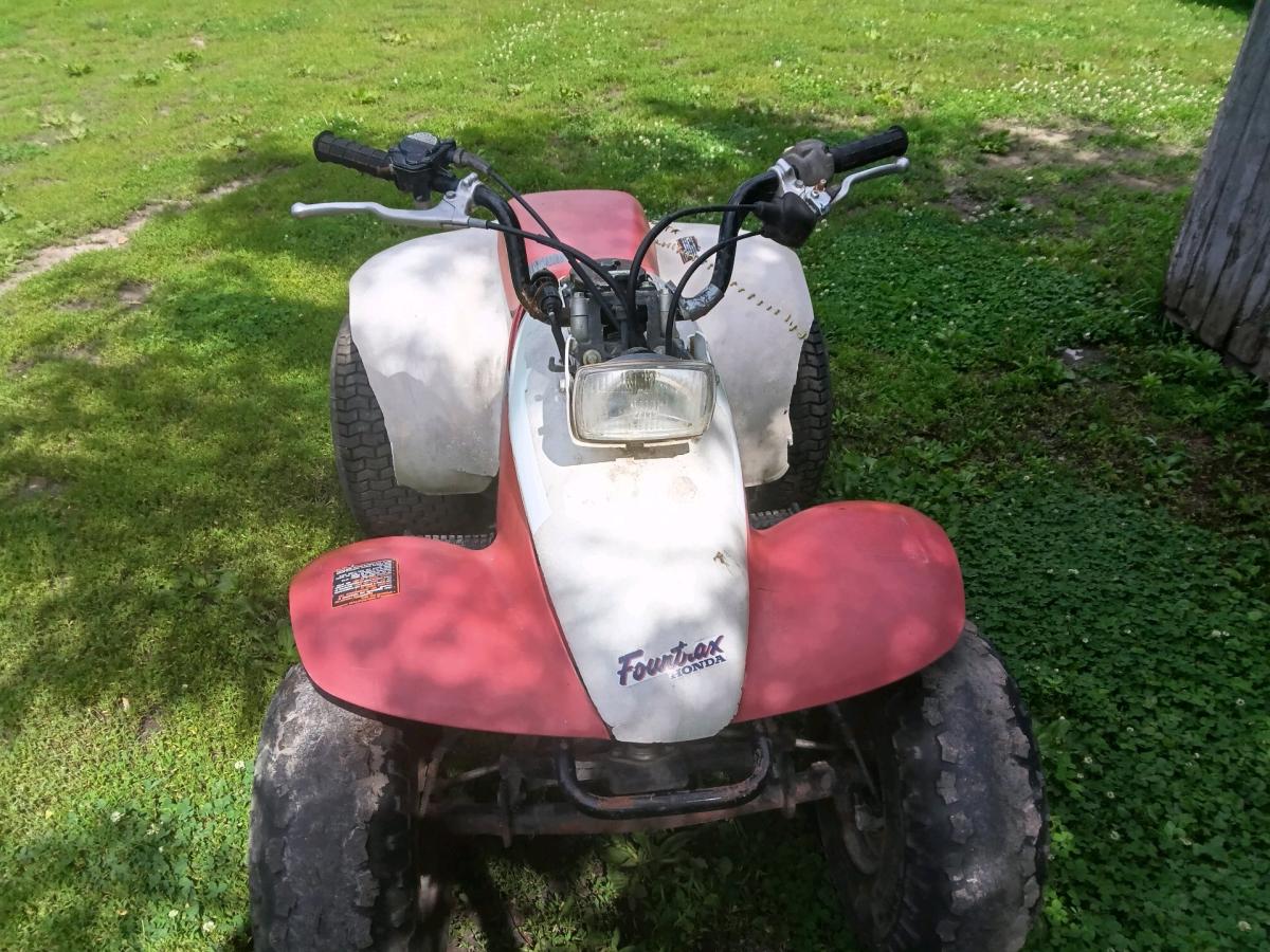 1985 red and white Honda four tax fourwheeler - Browning, Missouri - FleaMarketBay