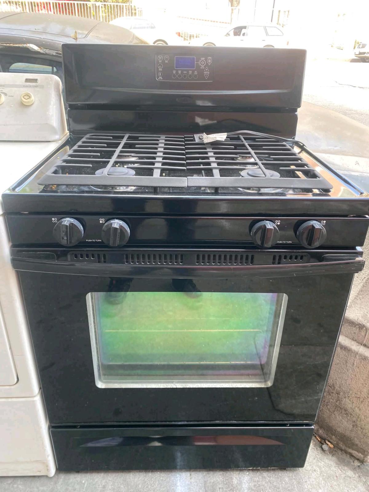 STOVE WHIRPOOL 4 BURNERS BLACK - Los Angeles, California - FleaMarketBay