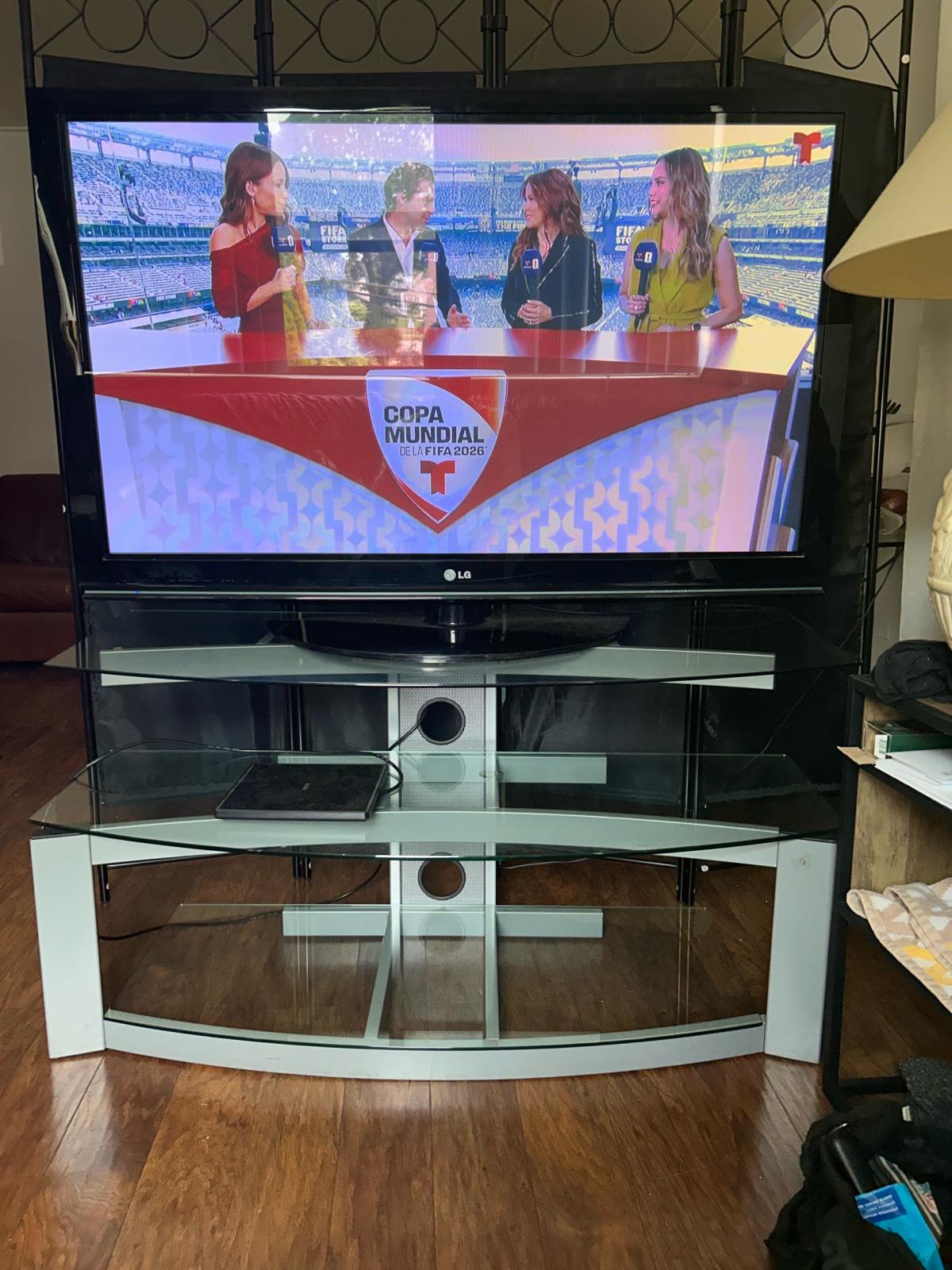 50LG smart TV with 3 tier metal and temper glass TV tablein - Hackensack, New Jersey - FleaMarketBay