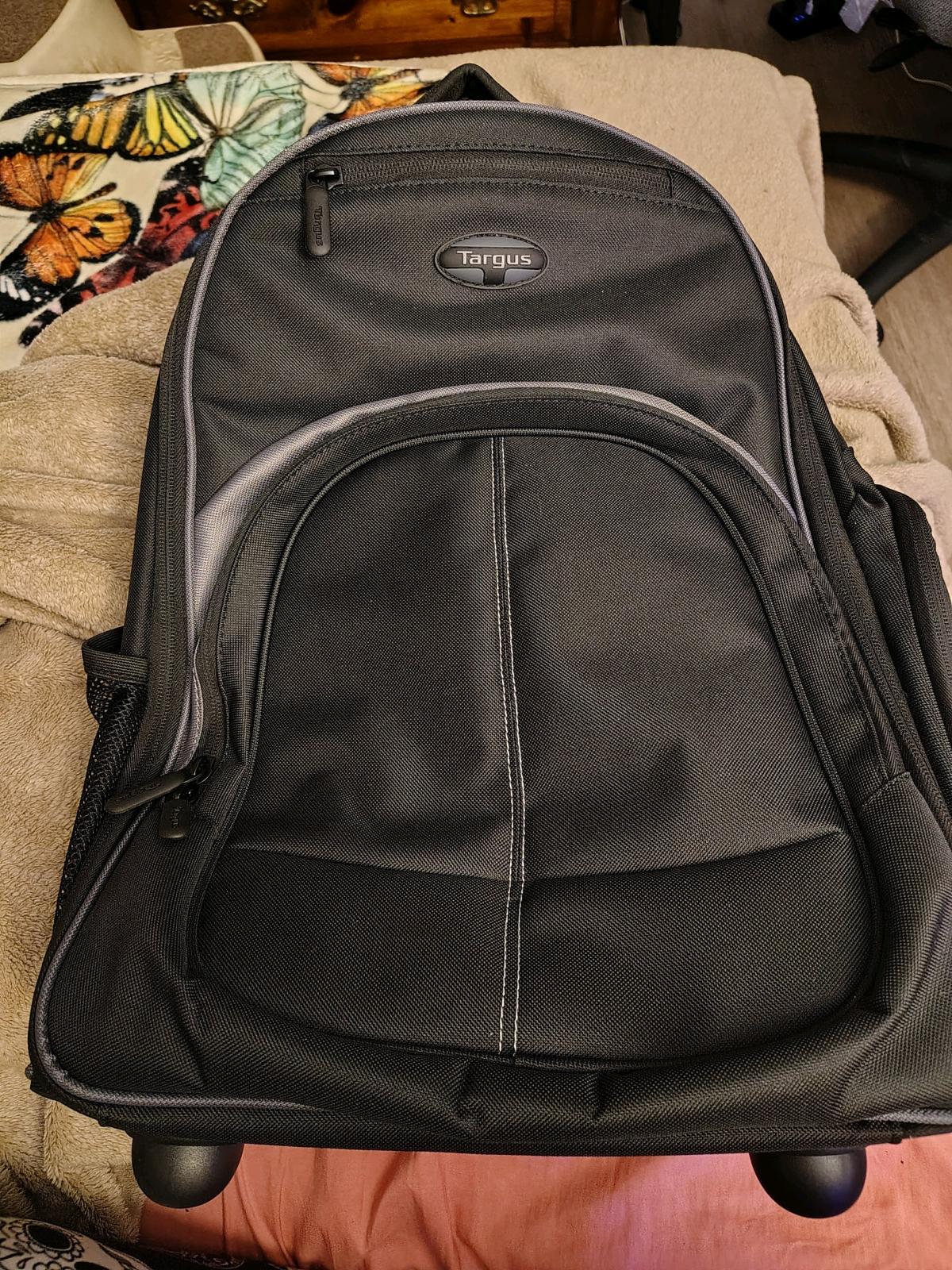 black rolling backpack and a purple non rolling backpack - Torrington, Connecticut - FleaMarketBay