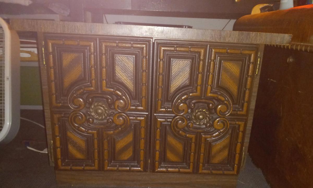 Vintage brown wood cabinet with 2 hinged carved wood doors - Blue Springs, Missouri - FleaMarketBay