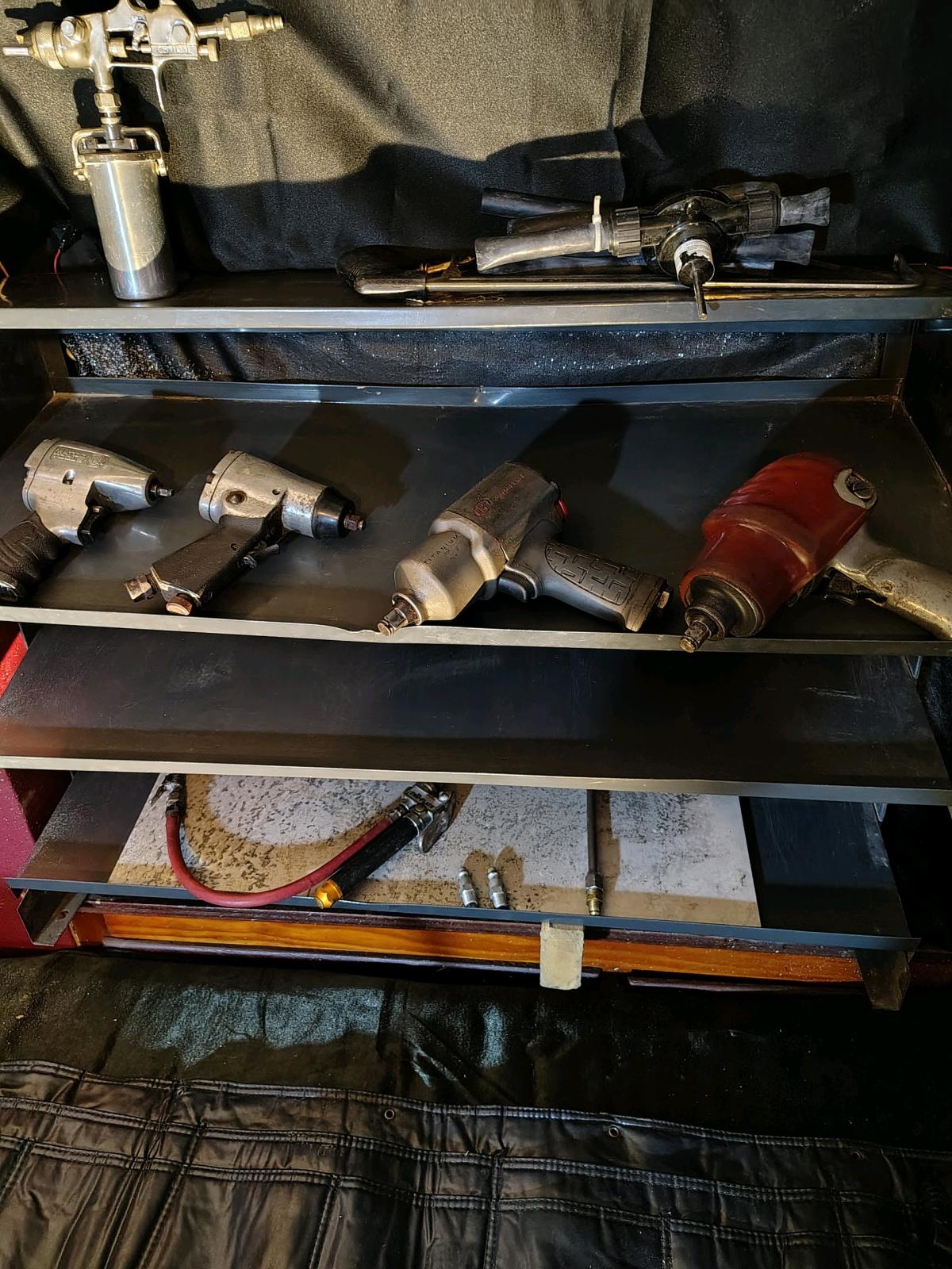 pneumatic tools with a few accessories and a vintage battery - Fountaintown, Indiana - FleaMarketBay