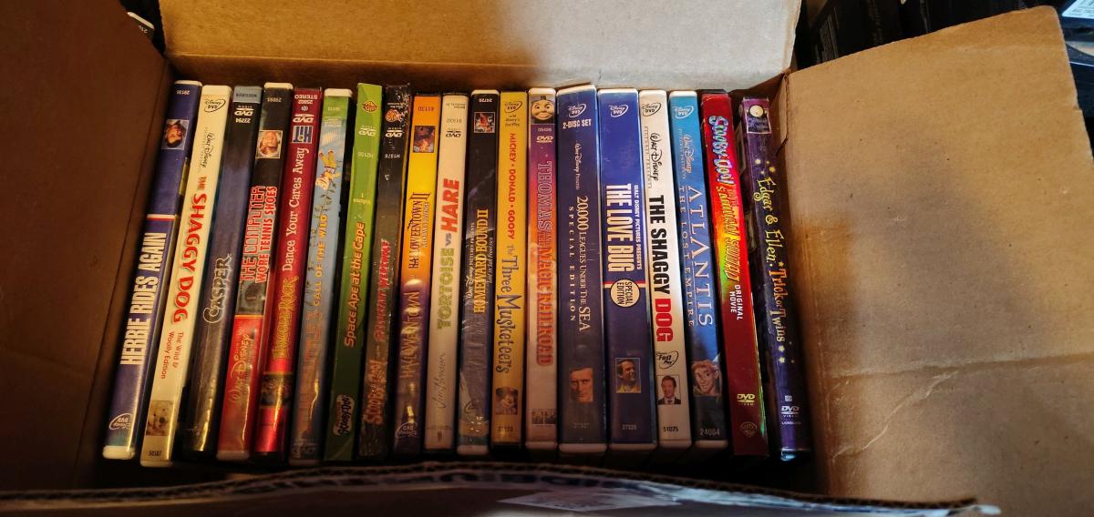 lot of DVDs and VHS types Android shape - Fountaintown, Indiana - FleaMarketBay