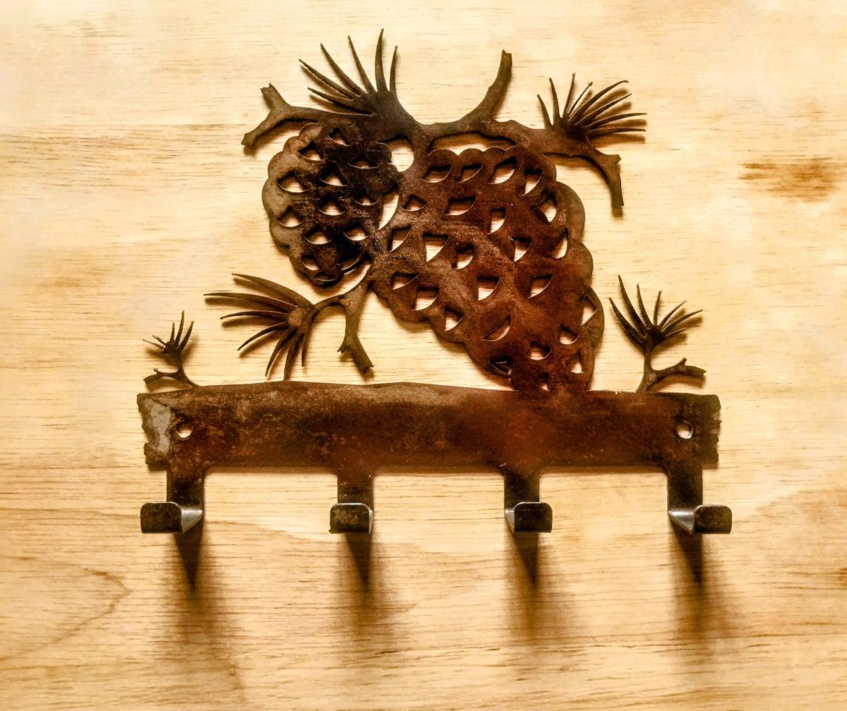 Rustic 4 Hook Metal Wall Hanging Decor With Pinecones - Longmont, Colorado - FleaMarketBay