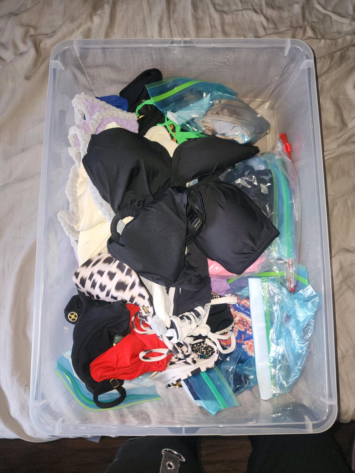 bins of small and medium swim suits - Alachua, Florida - FleaMarketBay