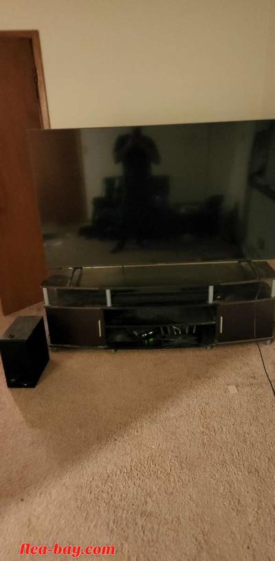 75in tv with entertainment center and soundbar with subwoofe - Thumbnail 2