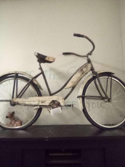 white vintage chrome bycicle with white wall tires