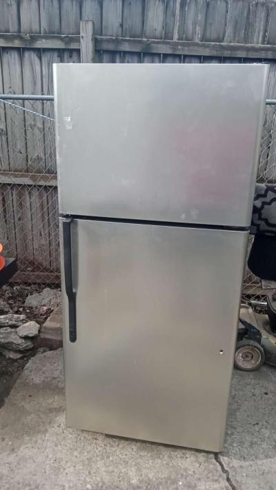 2 stoves and a refrigerator hot point is maker