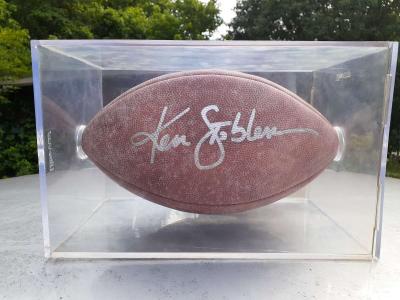 an autographed Ken Stabler football in an acrylic case - Thumbnail 2