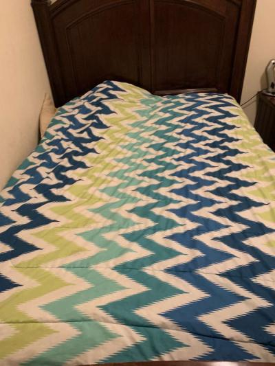 a couch a bed a dresser and a tv stand and a side table - Thumbnail 5