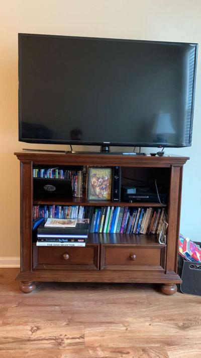 a couch a bed a dresser and a tv stand and a side table - Thumbnail 3