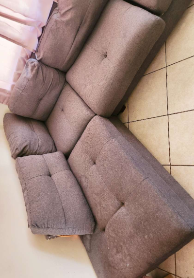 Grey sectional sofa with ottoman