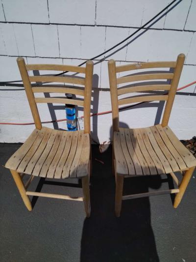 two wooden Pellegrin chairs and pieced for one