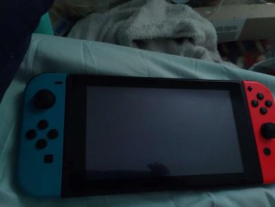 Nintendo switch neon red and blue and accessories - Thumbnail 2